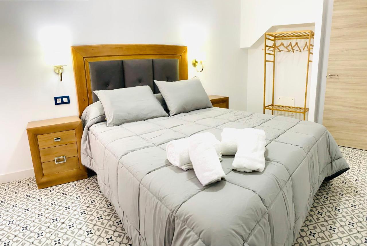 Al-Qazeres Suites Касерес Экстерьер фото