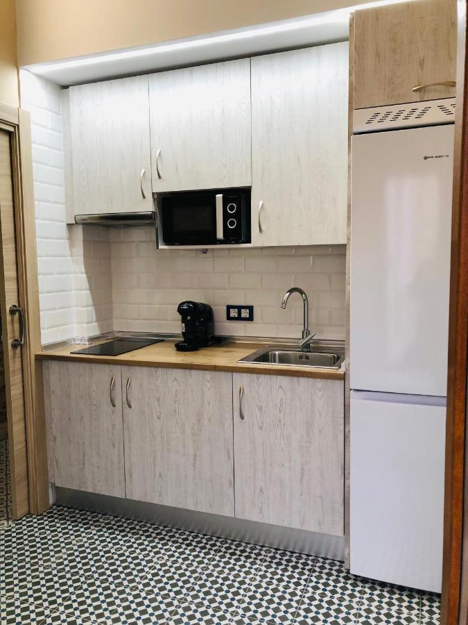 Al-Qazeres Suites Касерес Экстерьер фото